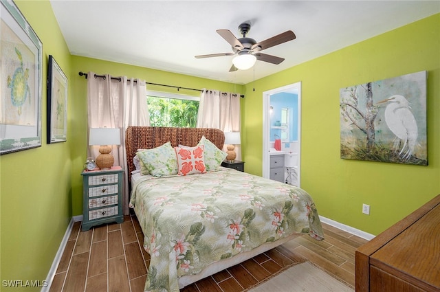 bedroom featuring ceiling fan and ensuite bathroom