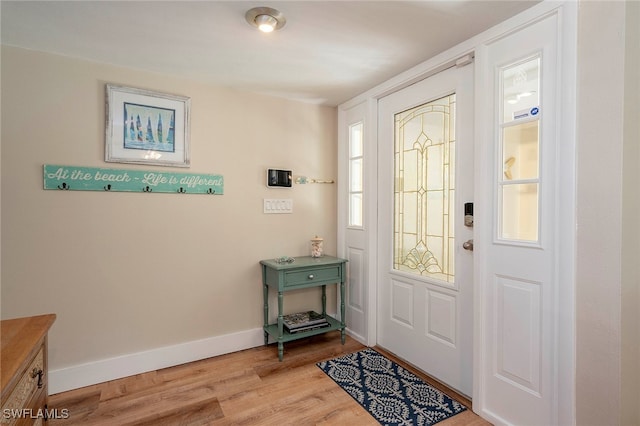 entrance foyer featuring light wood-type flooring