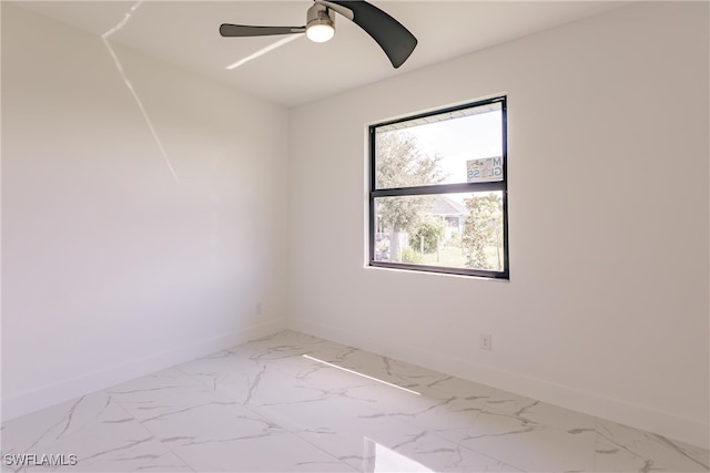 empty room featuring ceiling fan