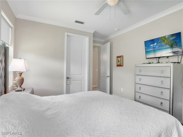 bedroom featuring ceiling fan and crown molding