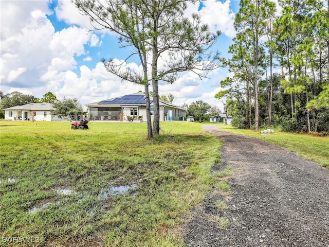 exterior space featuring a front lawn