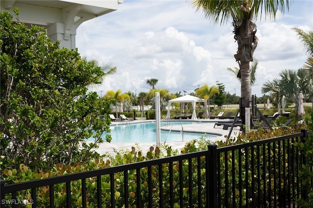 view of pool featuring a patio area and a gazebo