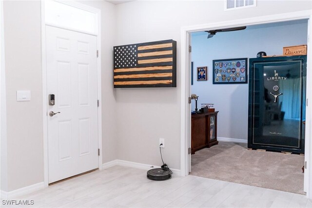 foyer featuring light wood-type flooring