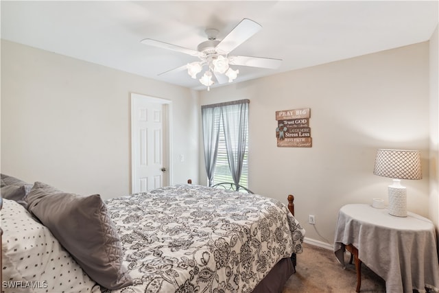 bedroom featuring ceiling fan and light colored carpet