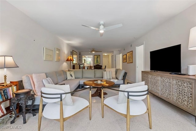 living room with ceiling fan