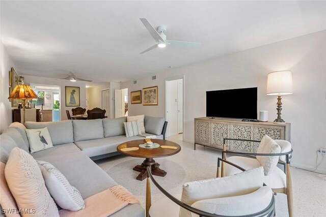 living room with ceiling fan