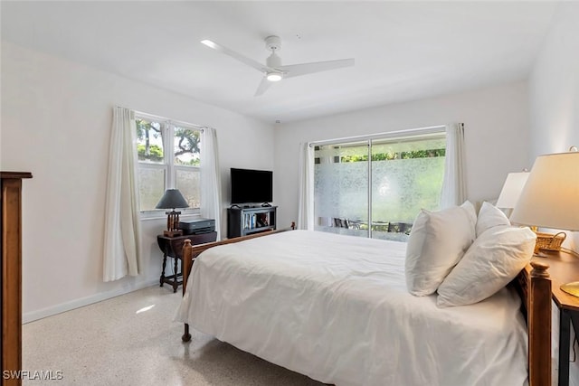 carpeted bedroom featuring ceiling fan and access to exterior