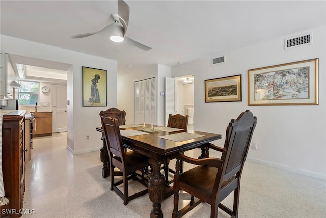 dining area featuring ceiling fan