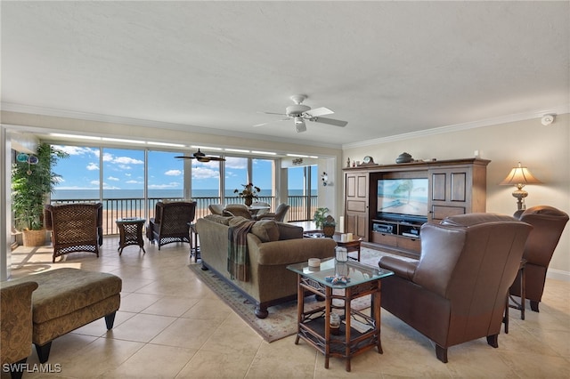 tiled living room with crown molding, a water view, and ceiling fan