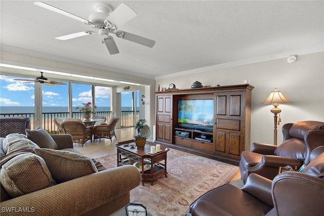 living room with ceiling fan, ornamental molding, and a water view