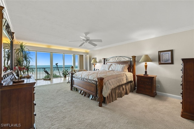 carpeted bedroom with crown molding, a water view, ceiling fan, and access to exterior