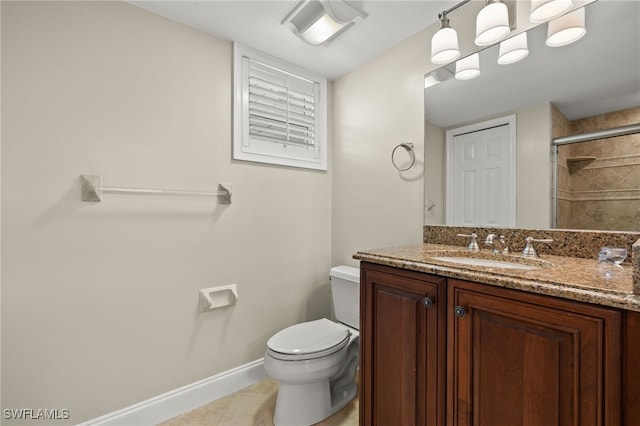 bathroom featuring walk in shower, vanity, toilet, and tile patterned floors