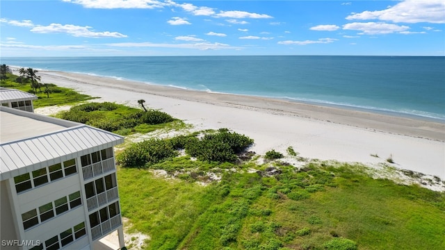 view of water feature with a beach view