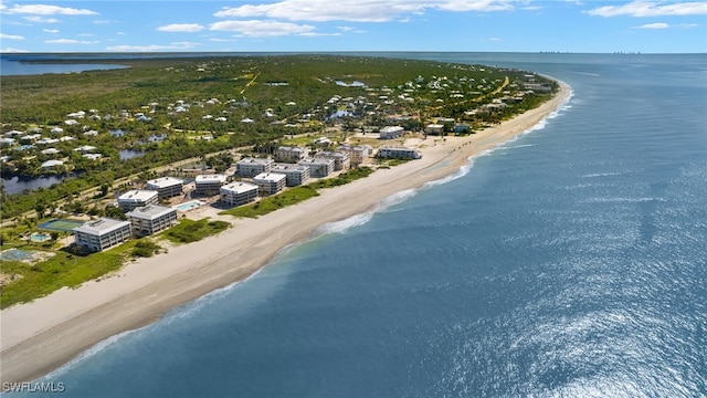 bird's eye view featuring a beach view and a water view