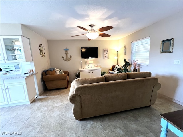 living room featuring ceiling fan