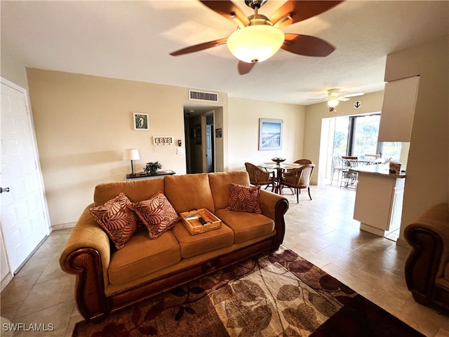 living room featuring ceiling fan