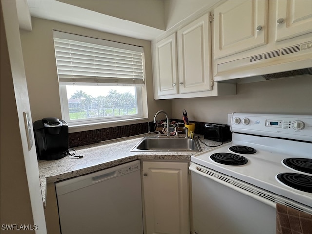 kitchen featuring range hood, white cabinets, white appliances, and sink