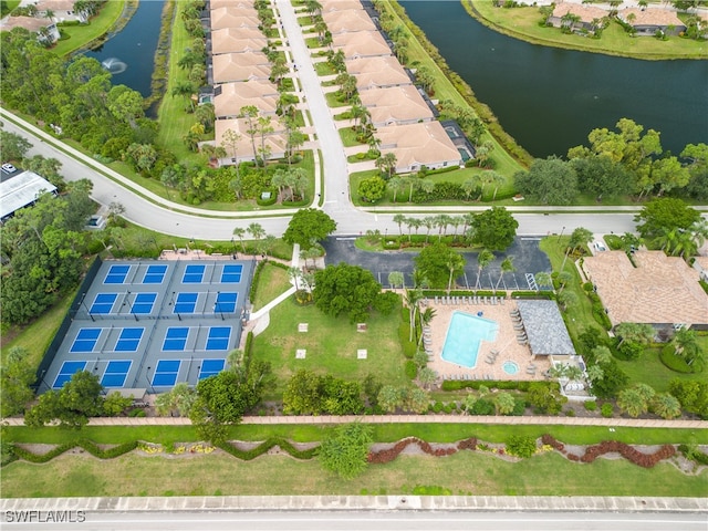 bird's eye view with a water view