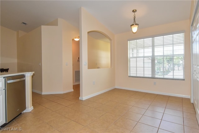 kitchen with dishwasher, light tile patterned floors, and hanging light fixtures