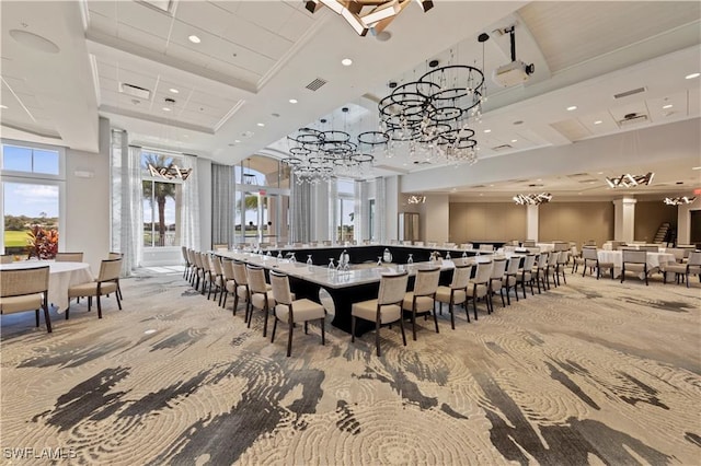 carpeted dining room with a towering ceiling