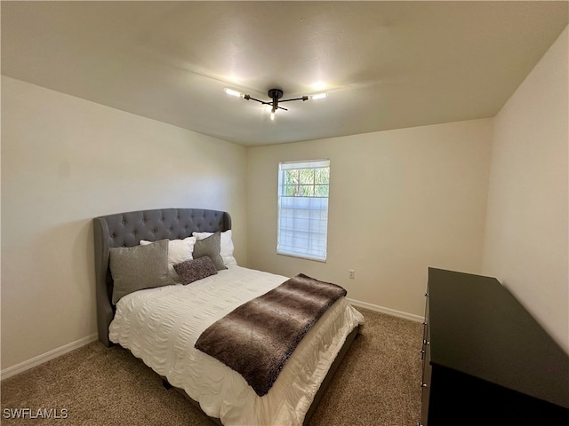 bedroom featuring dark carpet