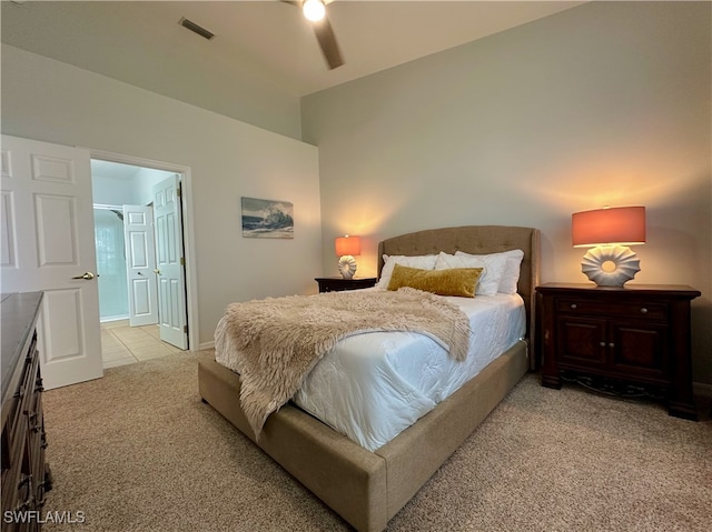 bedroom featuring ceiling fan and light colored carpet