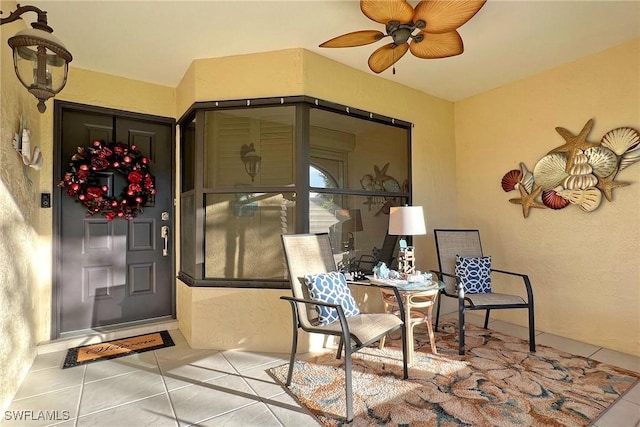 entrance to property featuring stucco siding