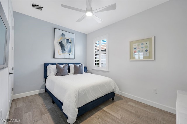 bedroom featuring ceiling fan and light wood-type flooring