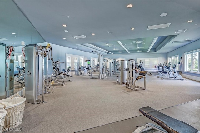 workout area featuring light carpet