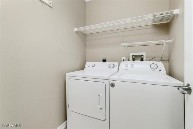 washroom with laundry area and washing machine and clothes dryer