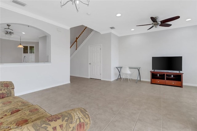 living room with tile patterned floors, visible vents, a ceiling fan, and recessed lighting