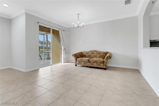 sitting room featuring visible vents, baseboards, ornamental molding, an inviting chandelier, and tile patterned flooring