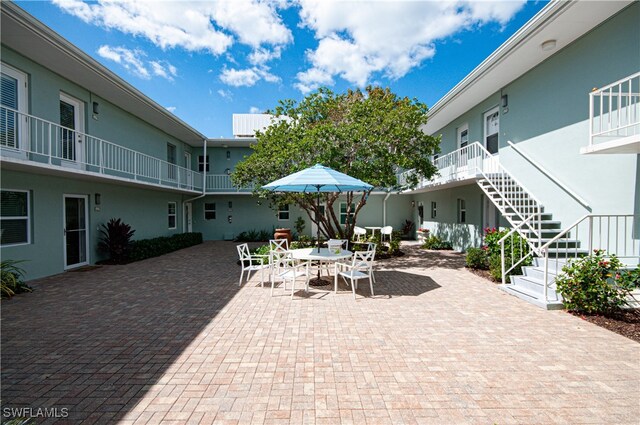 view of patio / terrace with a balcony