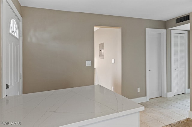 kitchen featuring light tile patterned flooring