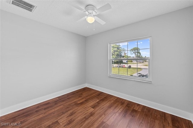 unfurnished room with wood-type flooring, ceiling fan, and a textured ceiling