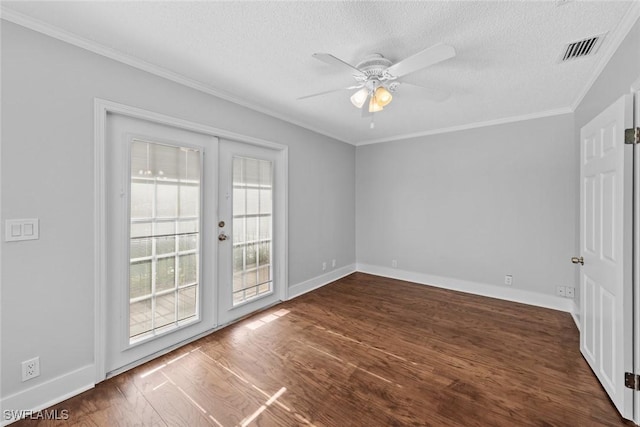 unfurnished room with crown molding, dark hardwood / wood-style floors, ceiling fan, and french doors