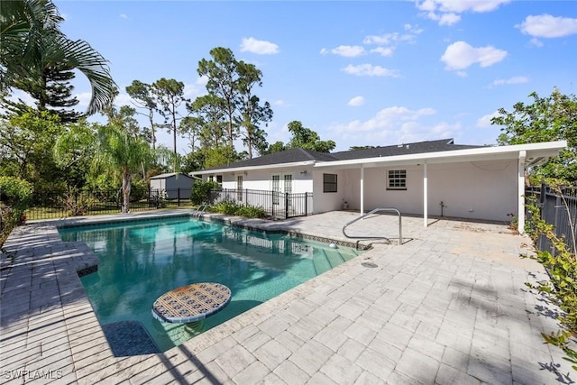 view of pool featuring a patio area