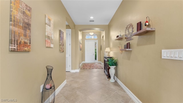 interior space featuring light tile patterned floors