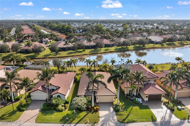 bird's eye view with a water view