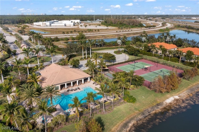 birds eye view of property with a water view