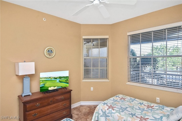 bedroom featuring ceiling fan