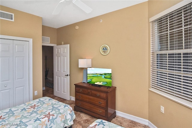 bedroom featuring a closet and ceiling fan