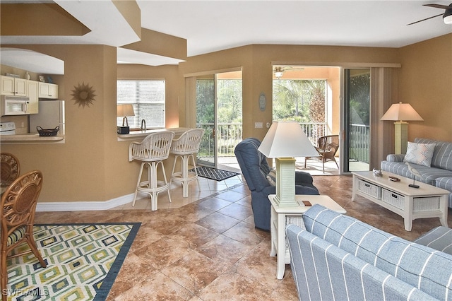 living room featuring ceiling fan