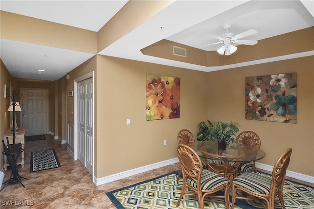 dining space with ceiling fan