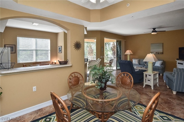 dining space featuring ceiling fan