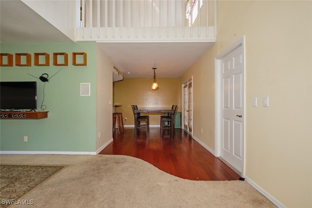 foyer entrance with dark wood-type flooring