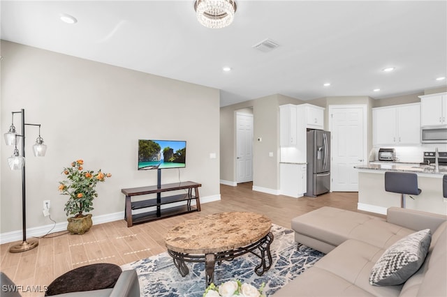 living room with light wood-type flooring