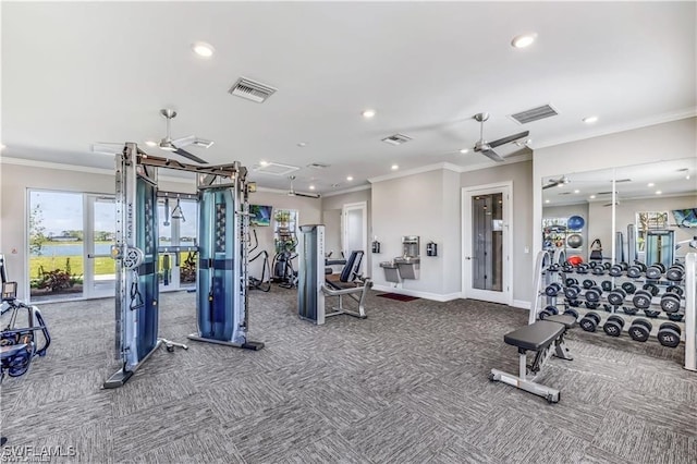 workout area featuring ornamental molding, carpet flooring, and ceiling fan