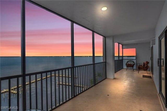 sunroom with a water view