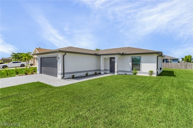 view of front facade featuring a front yard and a garage